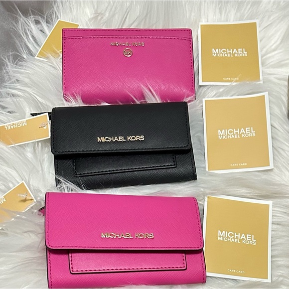 Michael Kors Handbags - Michael kors small wallet $50each